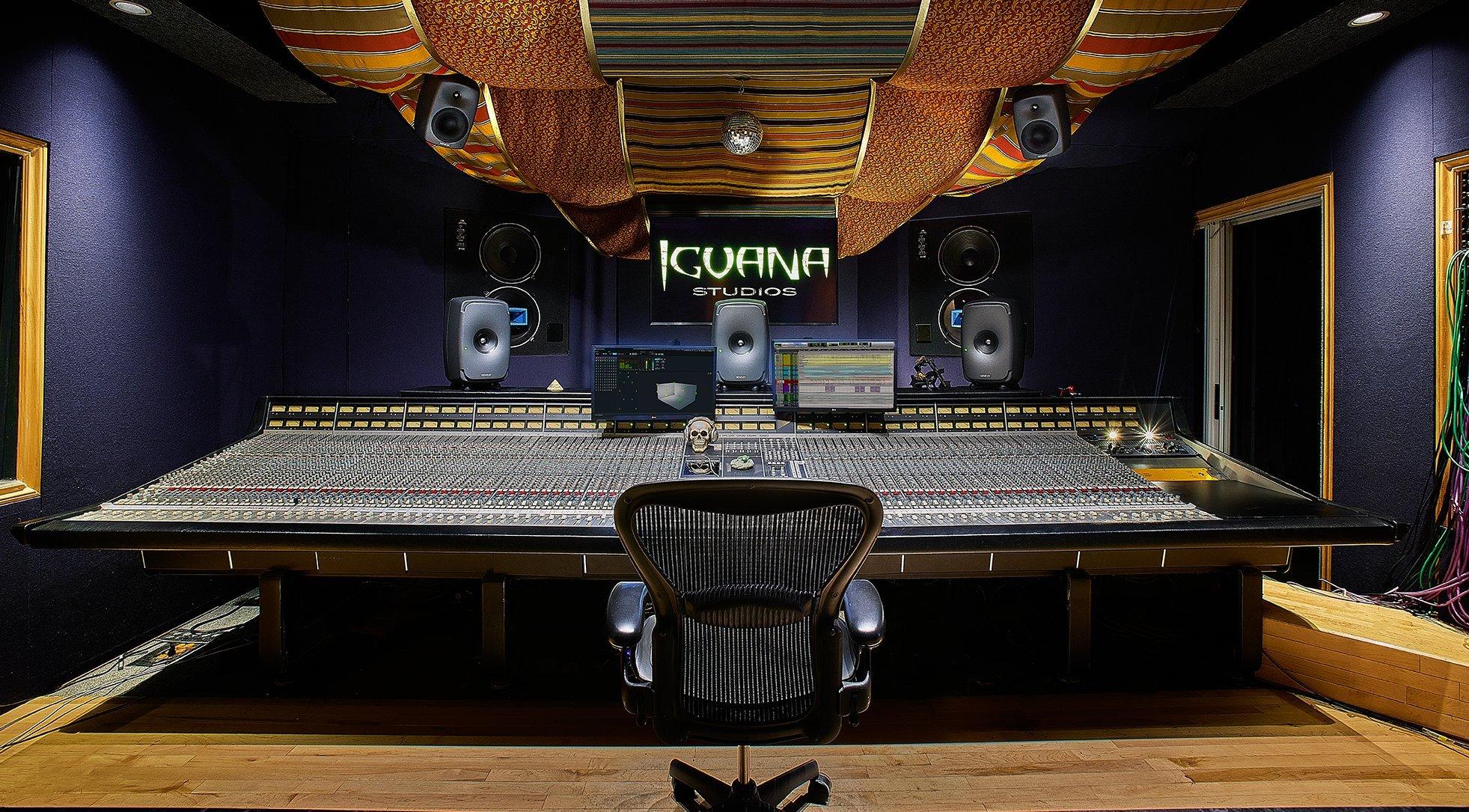 a large room with a large sound board and a chair